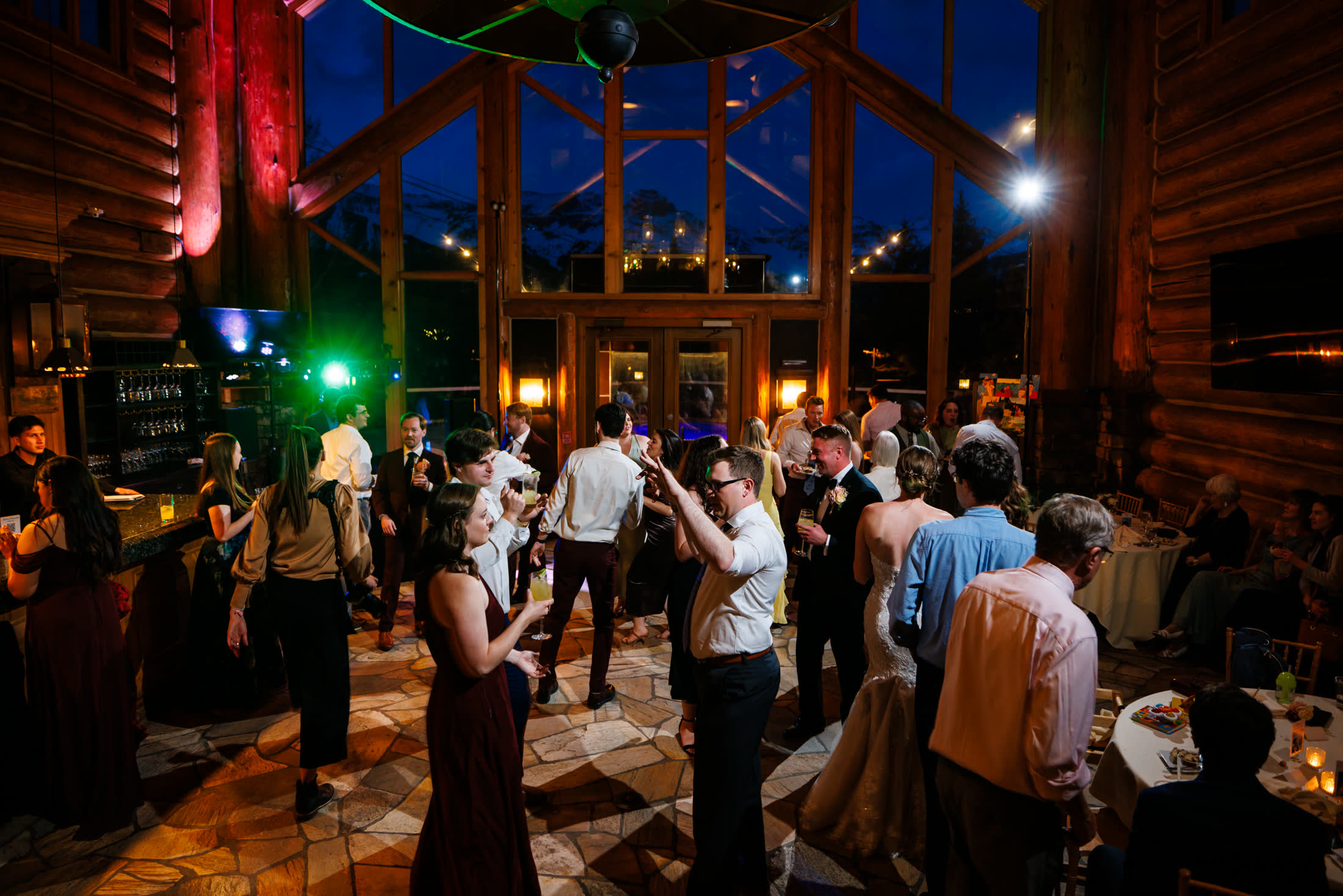 Full dance floor at Mountain Lodge Telluride with the mountains in the windows