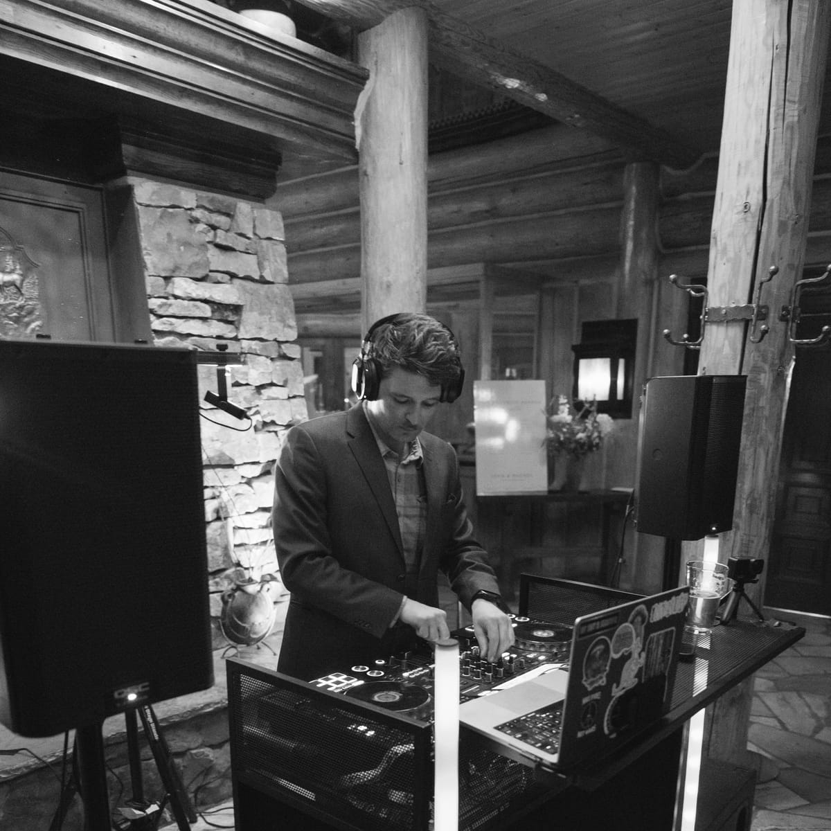 Flowmatic DJ setup with speakers and lights in the great room